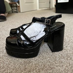 Torrid Double Platform Patent Caged Heel